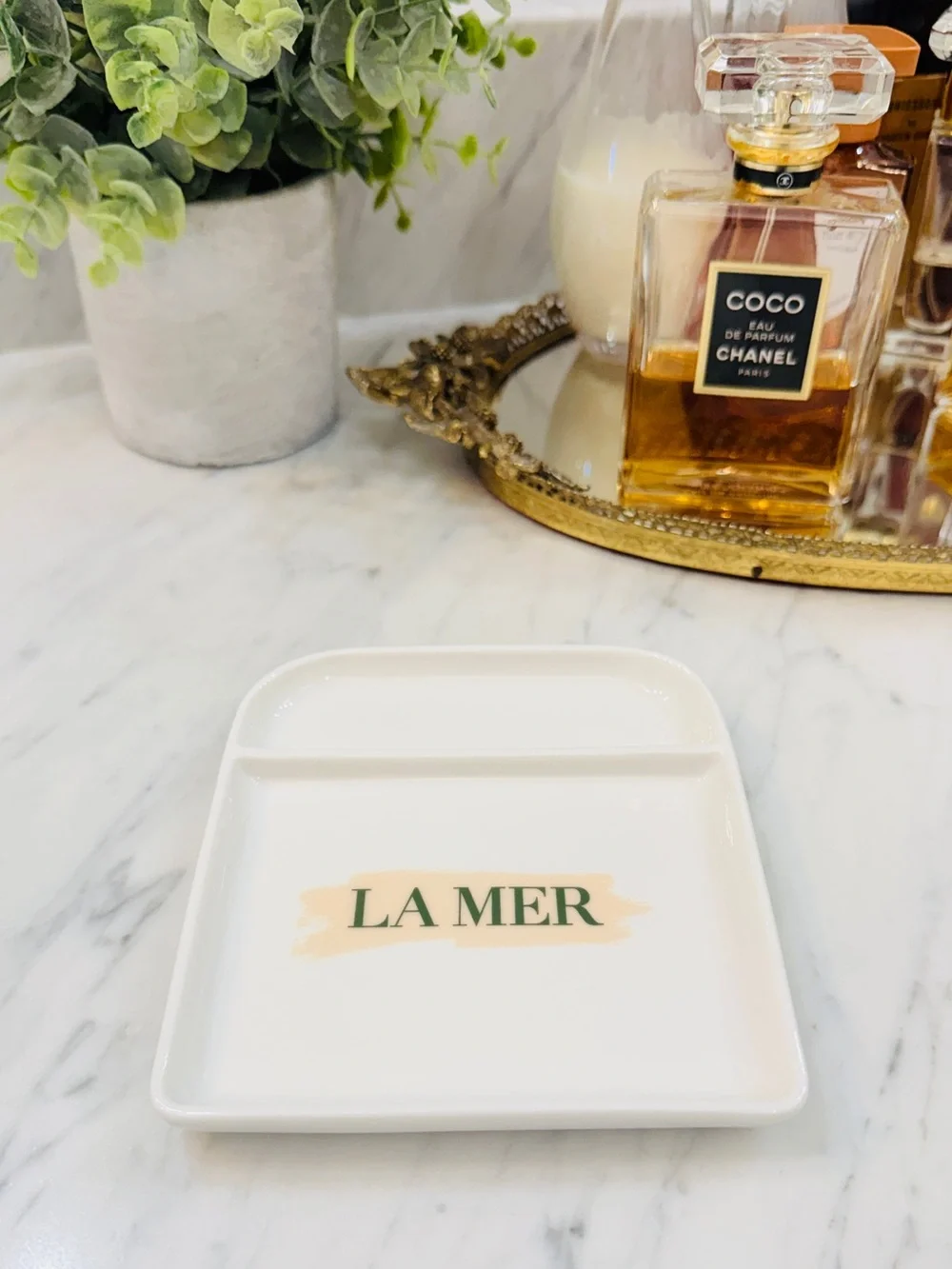 La Mer White Porcelain Trinket Tray with Green Logo and Beige Accent